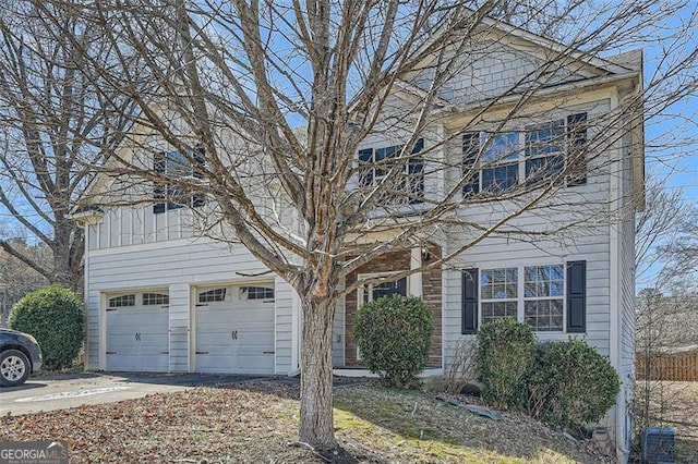 view of front of house featuring a garage and driveway