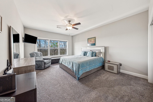 bedroom featuring a ceiling fan, carpet, visible vents, and baseboards