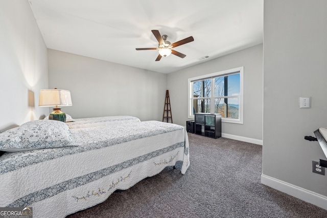 bedroom with carpet, visible vents, baseboards, and a ceiling fan