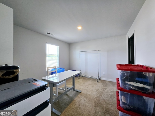 home office featuring baseboards, visible vents, and carpet flooring