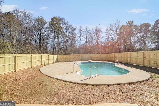 view of pool featuring a fenced backyard, a fenced in pool, and a patio