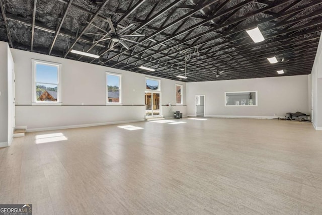 garage featuring baseboards