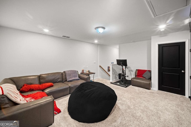 carpeted living area with baseboards, visible vents, and recessed lighting