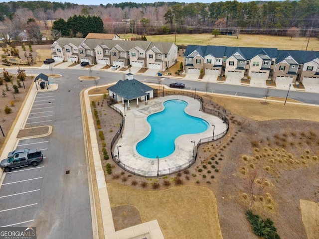 view of pool featuring a residential view