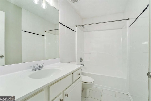 bathroom featuring  shower combination, tile patterned flooring, vanity, and toilet