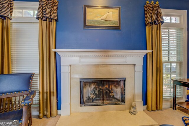 interior details featuring a fireplace