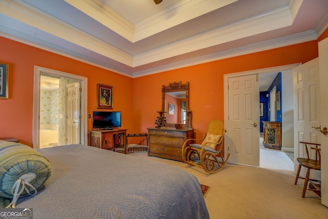 bedroom featuring a raised ceiling, carpet flooring, and crown molding