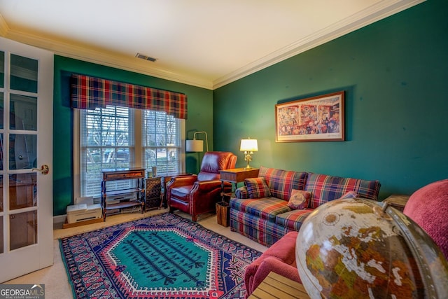 carpeted living area with french doors, visible vents, and crown molding