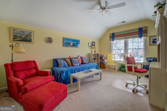 carpeted living area with a ceiling fan, lofted ceiling, and visible vents