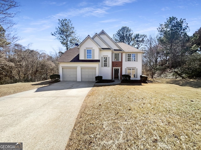 view of front of house featuring a garage, a front lawn, concrete driveway, and roof with shingles