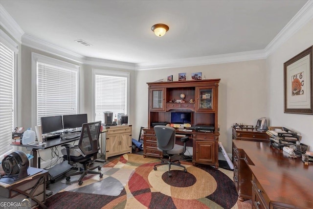 office space featuring ornamental molding and visible vents