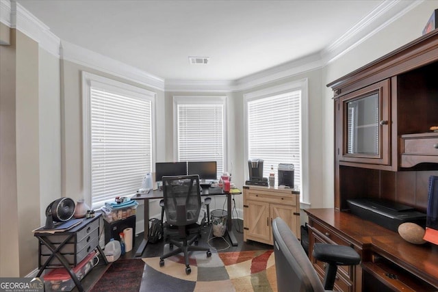 office with visible vents and crown molding