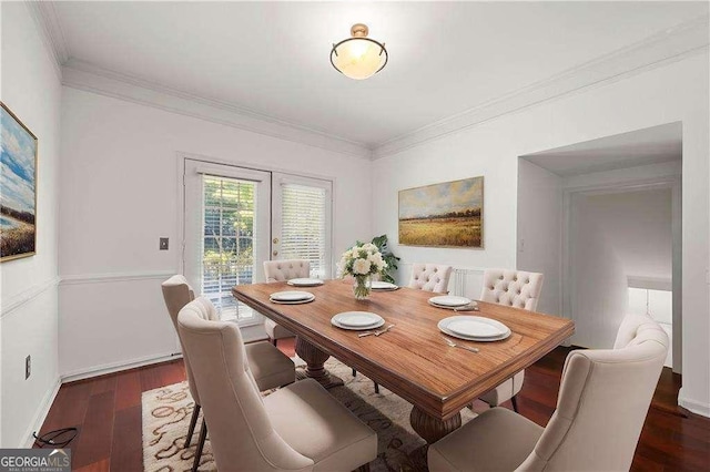 dining area with dark wood-style floors, french doors, crown molding, and baseboards