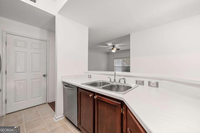 kitchen with light tile patterned floors, ceiling fan, a sink, light countertops, and dishwasher