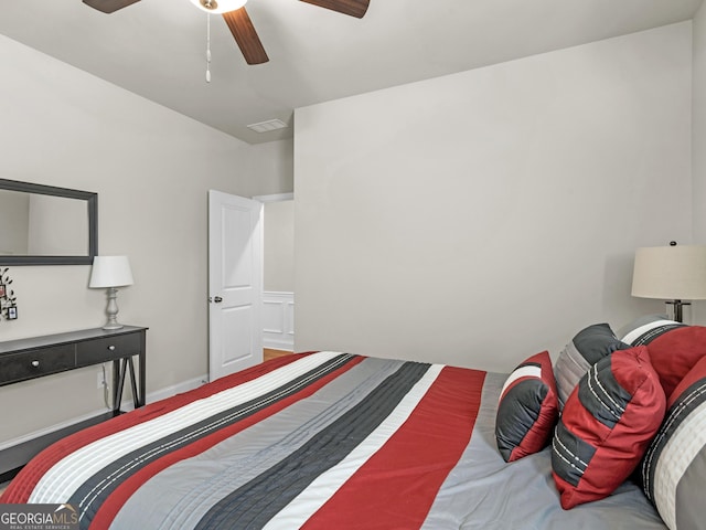 bedroom with visible vents, ceiling fan, and baseboards