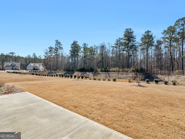 view of yard featuring fence