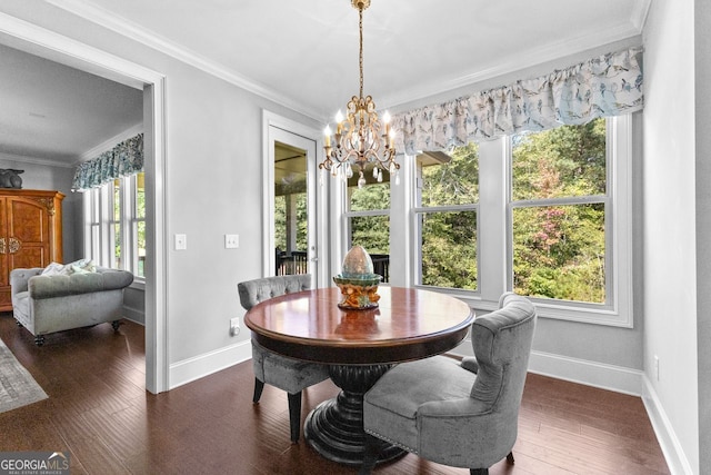 dining area with dark wood-style floors, baseboards, and ornamental molding