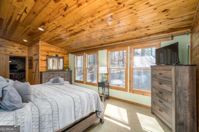 carpeted bedroom with wooden walls, wooden ceiling, and vaulted ceiling