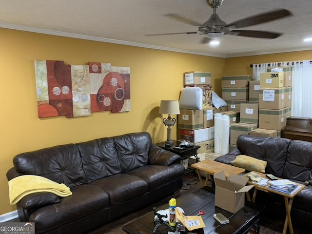 living area featuring crown molding and ceiling fan