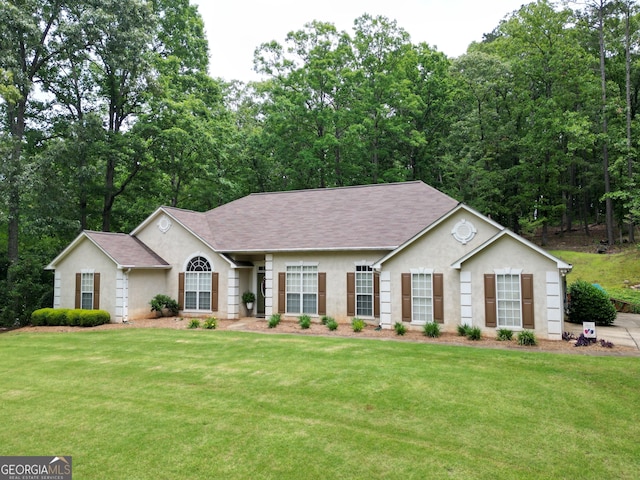 122 Cameron Pointe Dr, Lagrange, GA 30240 - single story home with stucco siding, a shingled roof, and a front yard