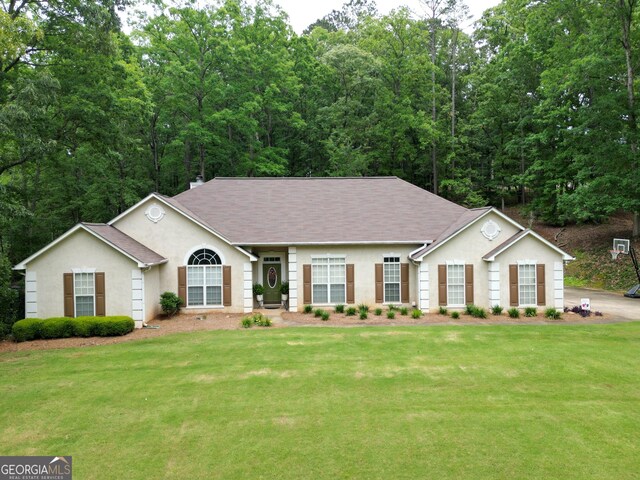 122 Cameron Pointe Dr, Lagrange, GA 30240 - ranch-style home featuring a front yard, stucco siding, and roof with shingles