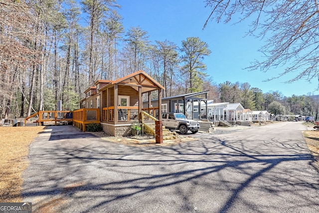 view of front of property featuring a deck