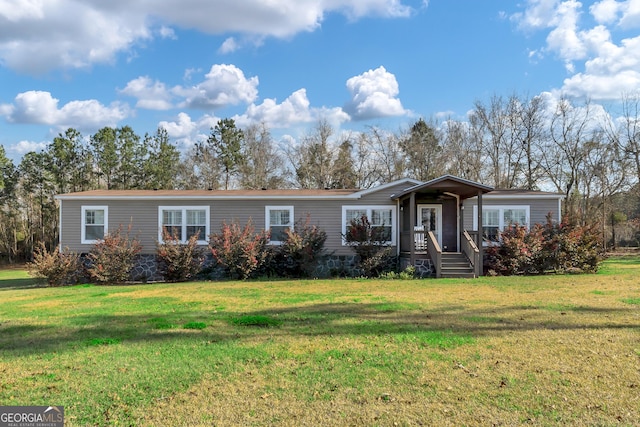 view of front of house with a front yard