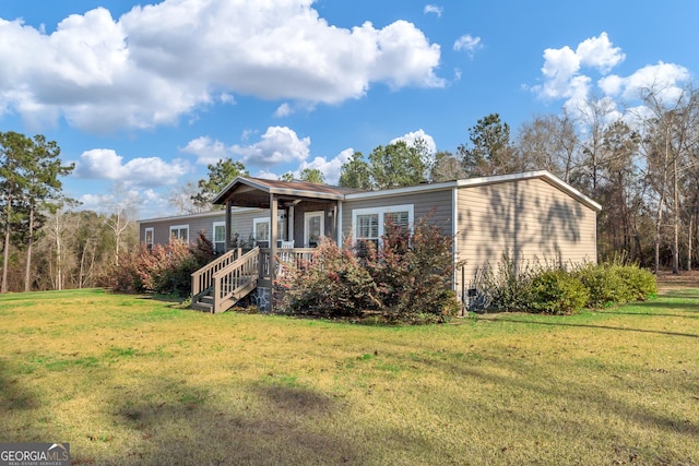 view of front of home with a front yard