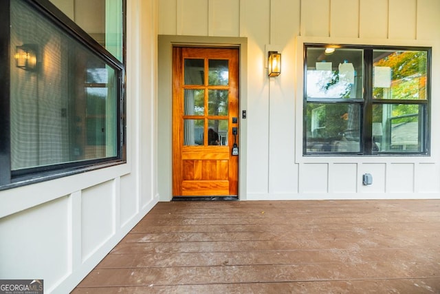 property entrance with board and batten siding