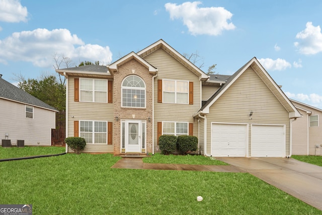 colonial house featuring brick siding, a front yard, an attached garage, and driveway