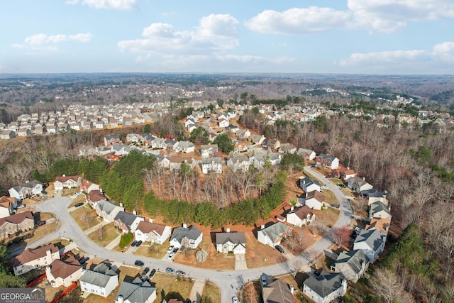 birds eye view of property with a residential view
