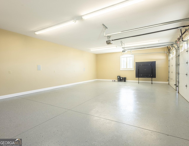 garage featuring baseboards