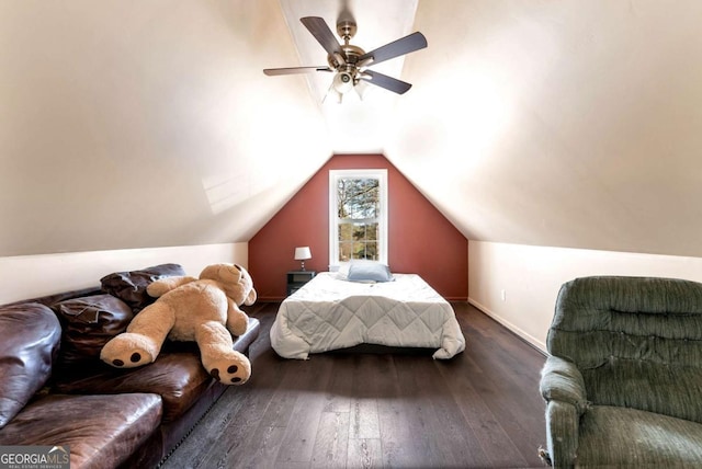 bedroom featuring lofted ceiling, ceiling fan, baseboards, and hardwood / wood-style flooring