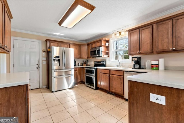 kitchen with light tile patterned floors, stainless steel appliances, open shelves, brown cabinetry, and ornamental molding