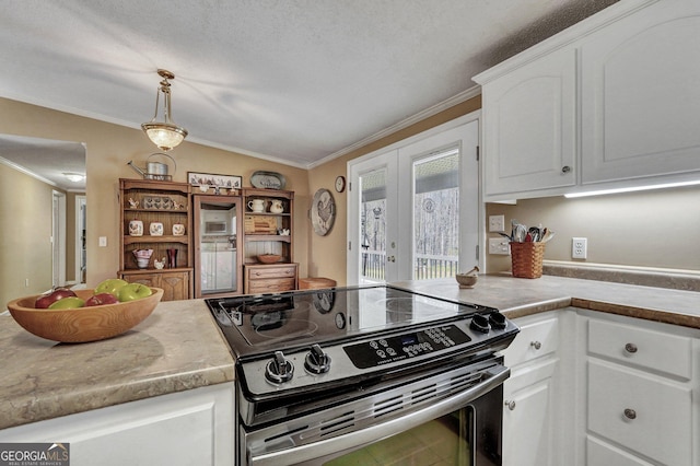 kitchen with electric stove, white cabinetry, crown molding, and french doors