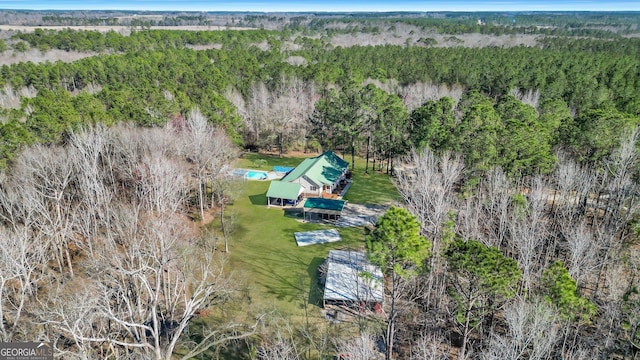 bird's eye view with a forest view