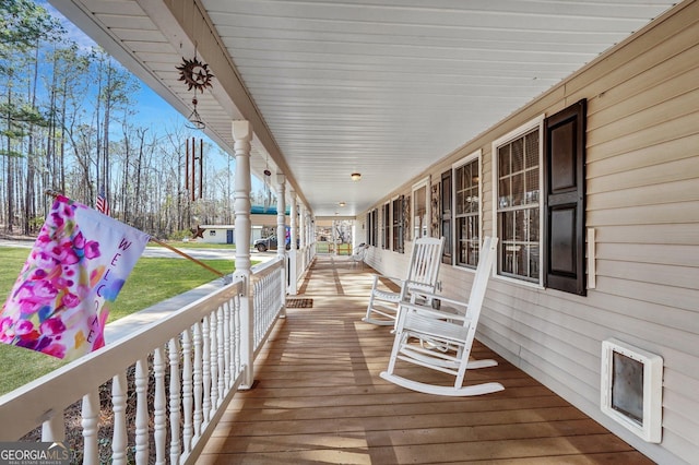 deck featuring a porch