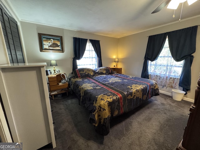 carpeted bedroom with baseboards, ornamental molding, and ceiling fan