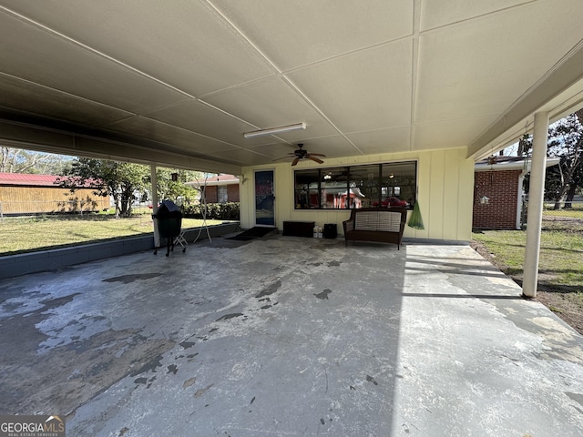 exterior space with a ceiling fan