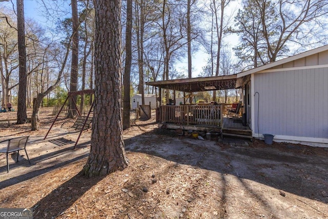 view of yard featuring a deck