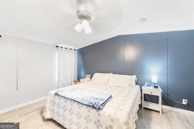 bedroom featuring a ceiling fan and wood finished floors