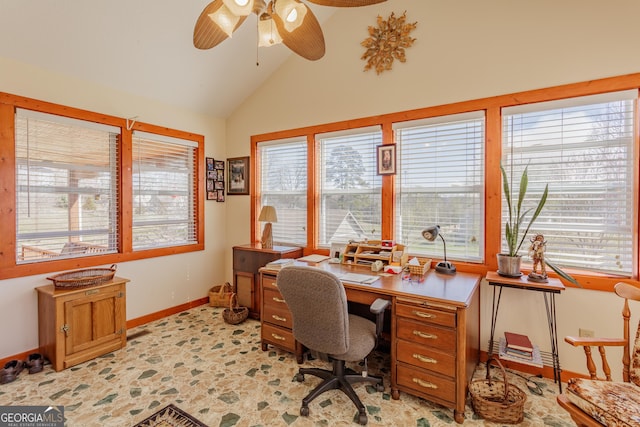 home office with high vaulted ceiling, baseboards, stone finish flooring, and ceiling fan