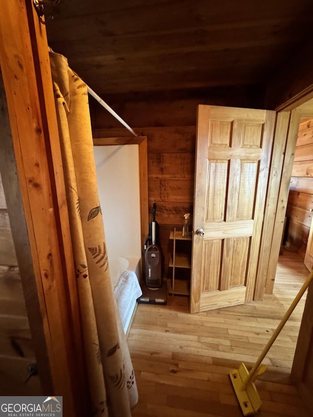 spacious closet featuring hardwood / wood-style flooring