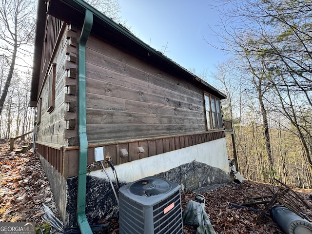 view of home's exterior with cooling unit