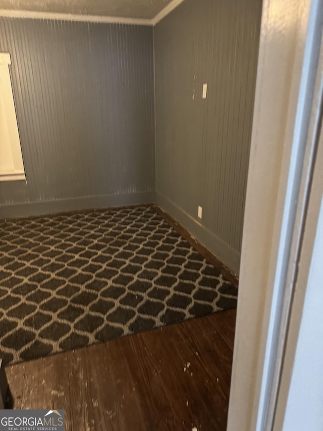 unfurnished room featuring wood finished floors