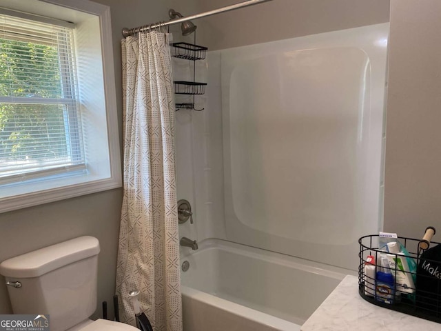 full bathroom with toilet and shower / bathtub combination with curtain