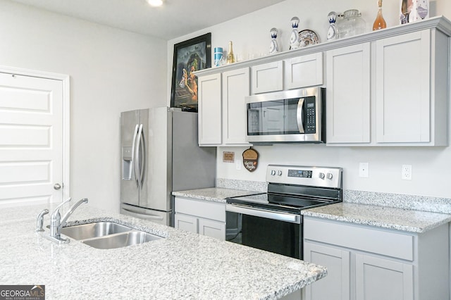 kitchen with stainless steel appliances and a sink