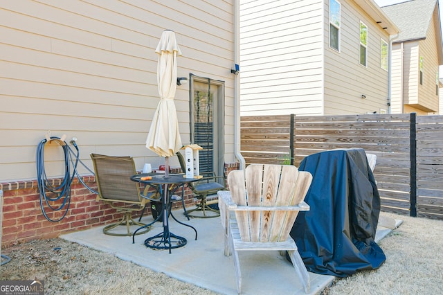 view of patio / terrace with fence