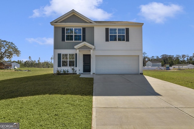 traditional-style home with a front lawn, driveway, and an attached garage