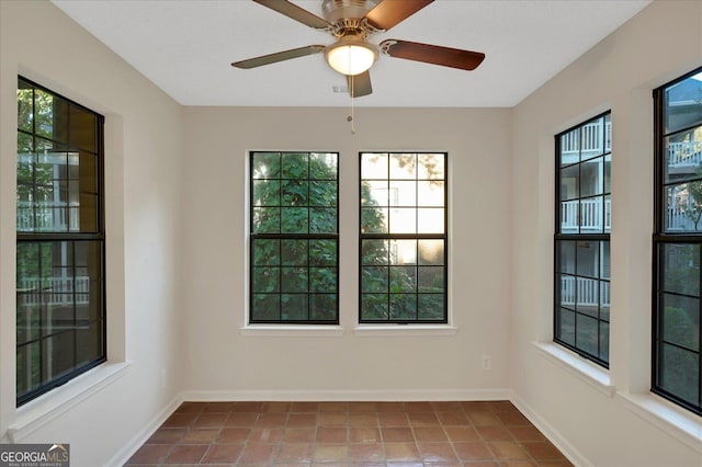 tiled empty room with baseboards